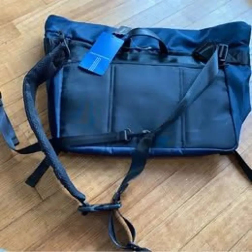 BRAND NEW w/tags - schkleier sling bag blue bike riding walking laptop section!